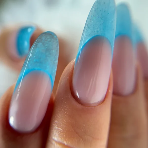 Coffin-shaped nails with blue wave French tips