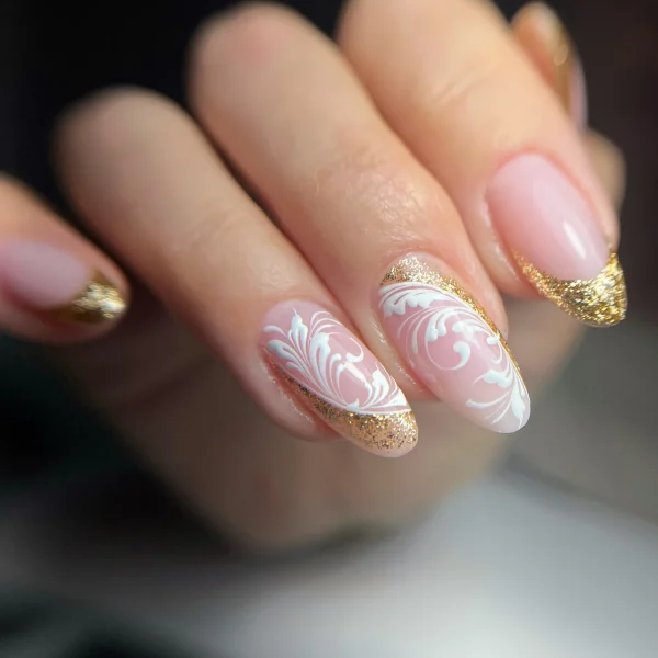 Almond-shaped nails with glitter and French tips